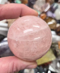 Pink Mangano Calcite sphere–50mm