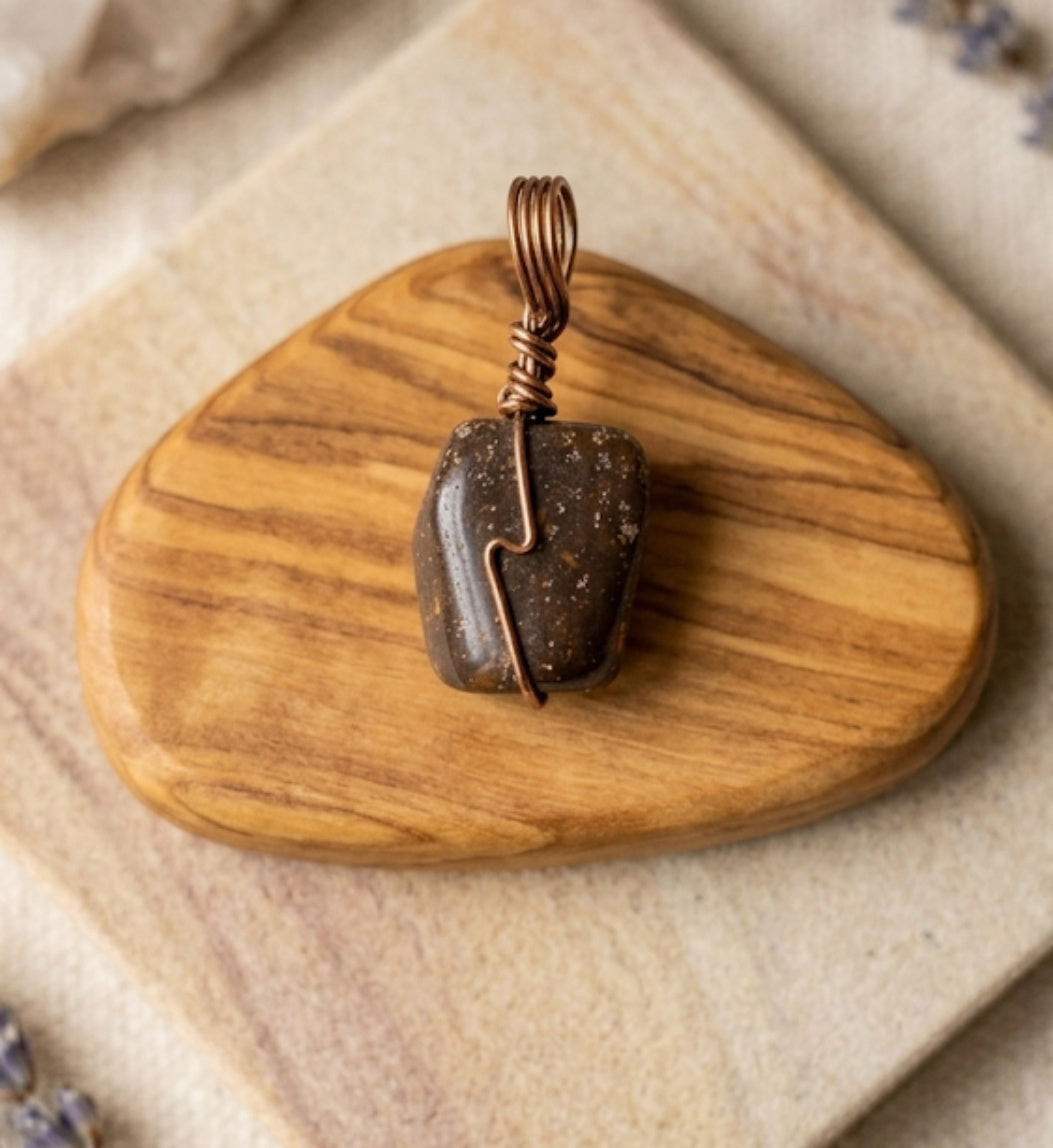 Artisan handcrafted wire wrapped natural crystal pendants
