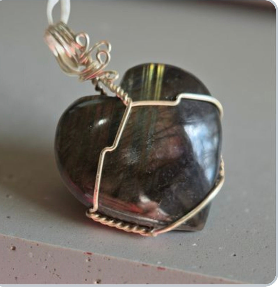 Artisan handcrafted wire wrapped natural crystal pendants