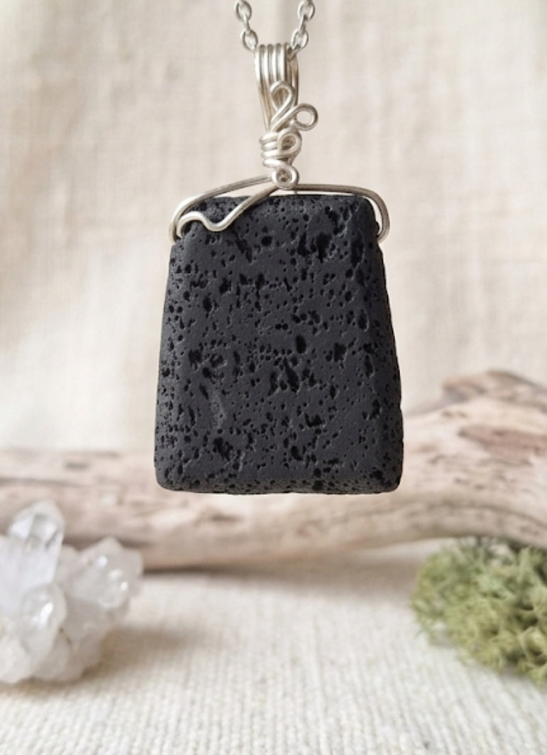 Artisan handcrafted wire wrapped natural crystal pendants