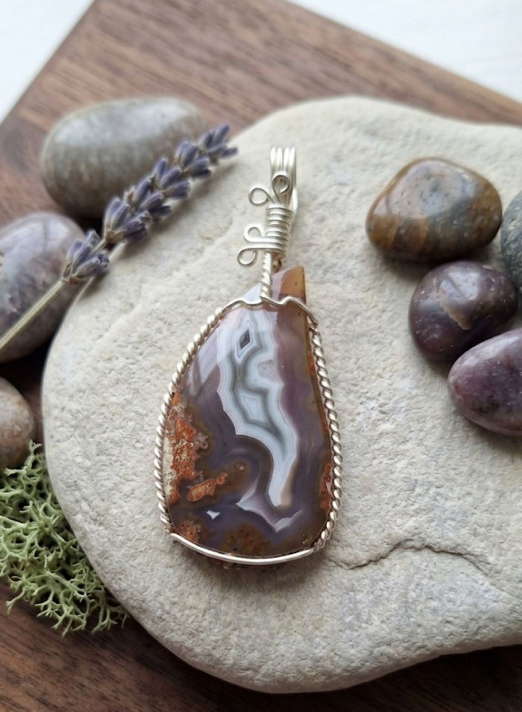 Artisan handcrafted wire wrapped natural crystal pendants