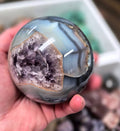 Orca Agate sphere with Deep Amethyst Crystal vug– 85mm