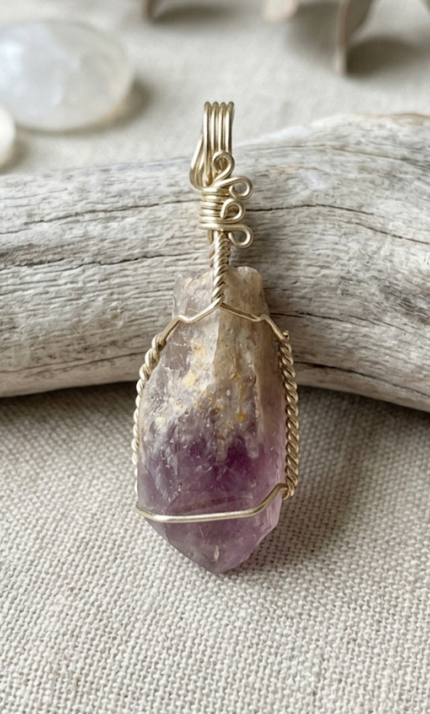 Artisan handcrafted wire wrapped natural crystal pendants