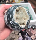 Moss Agate sphere with open Druzy vug– 90mm